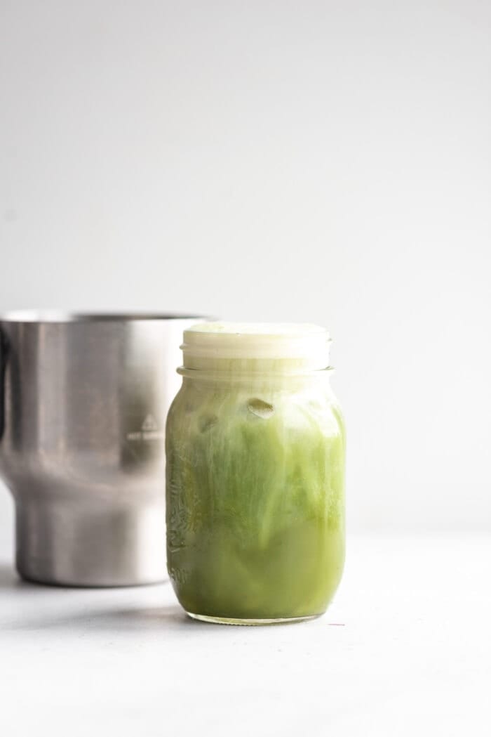 Iced matcha and milk container from the Breville Milk Cafe.