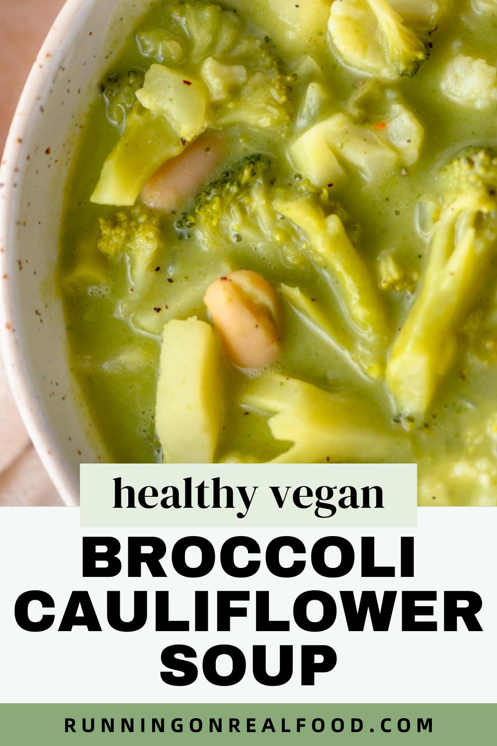 Pinterest graphic for healthy vegan broccoli cauliflower soup recipe with an image of the soup and a text title.