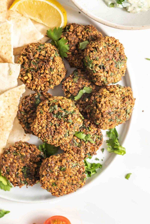 A plate of crispy falafel patties.