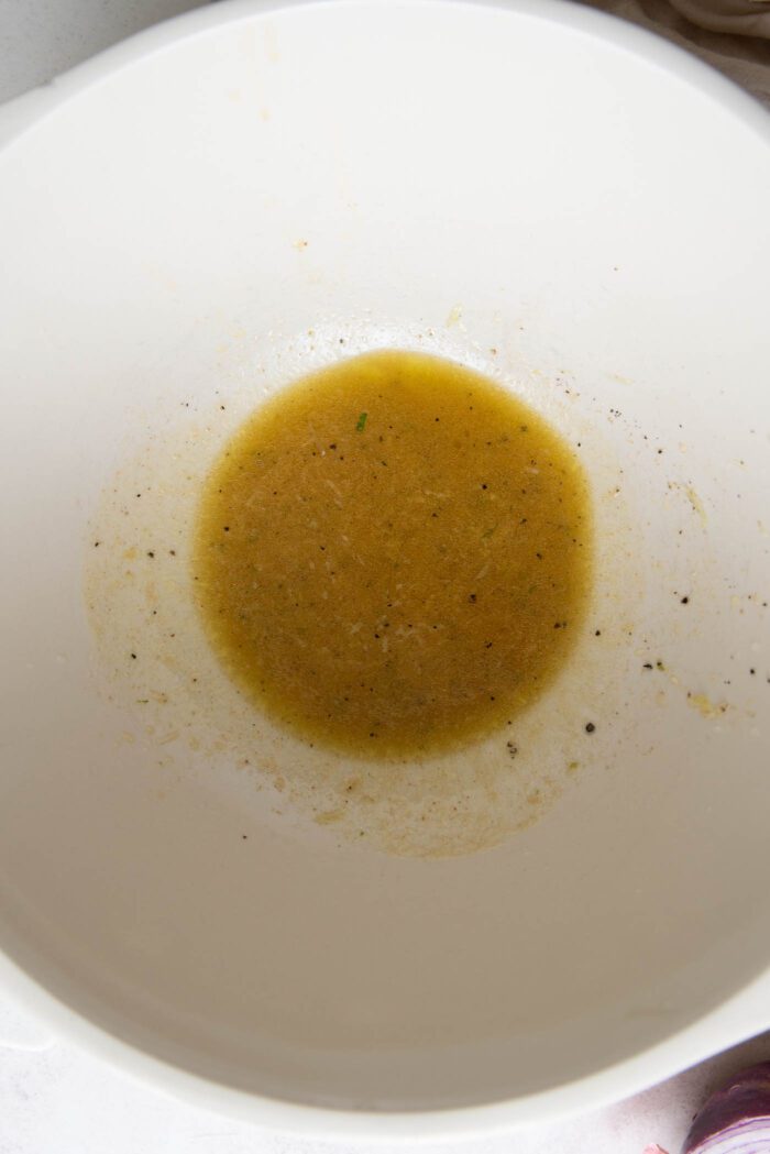 Lime vinaigrette in a large mixing bowl.