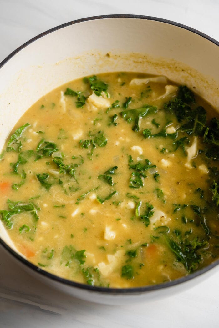 Kale cauliflower soup in a large pot.