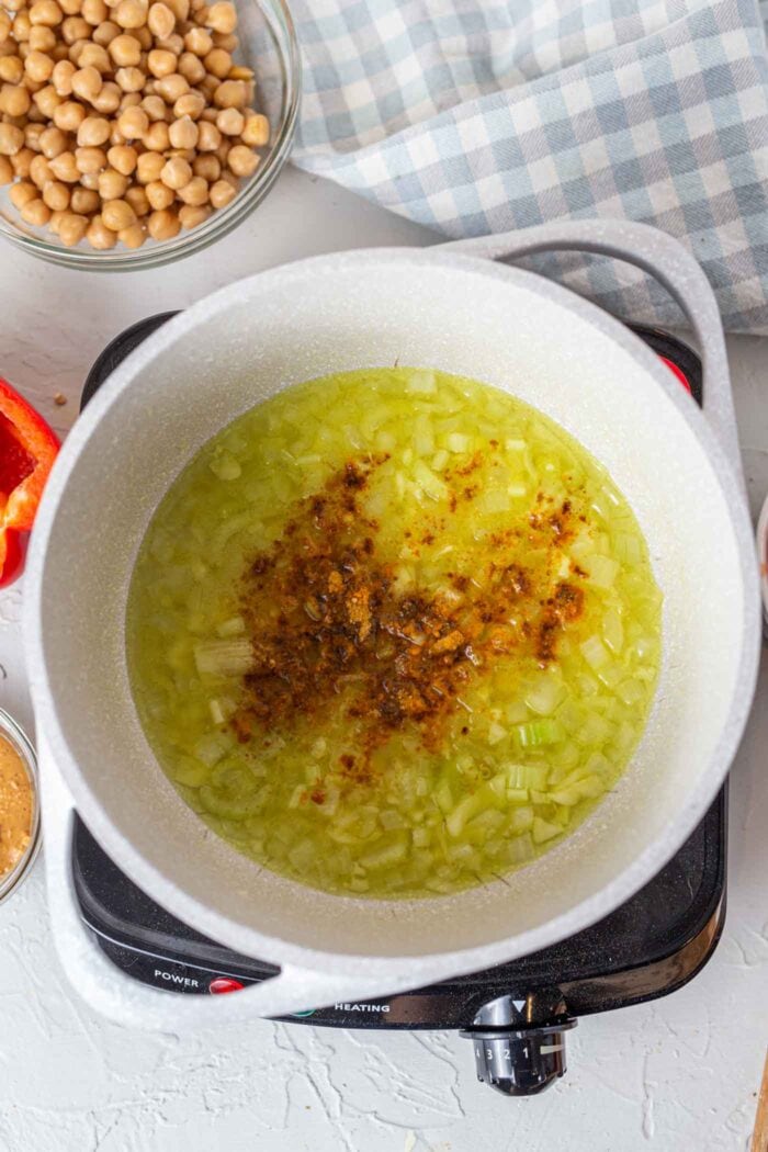 Sauteed celery, onion and spices in a large soup pot.
