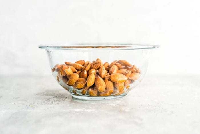 Drained and Rinsed Almonds in a Glass Bowl for Making Almond Milk