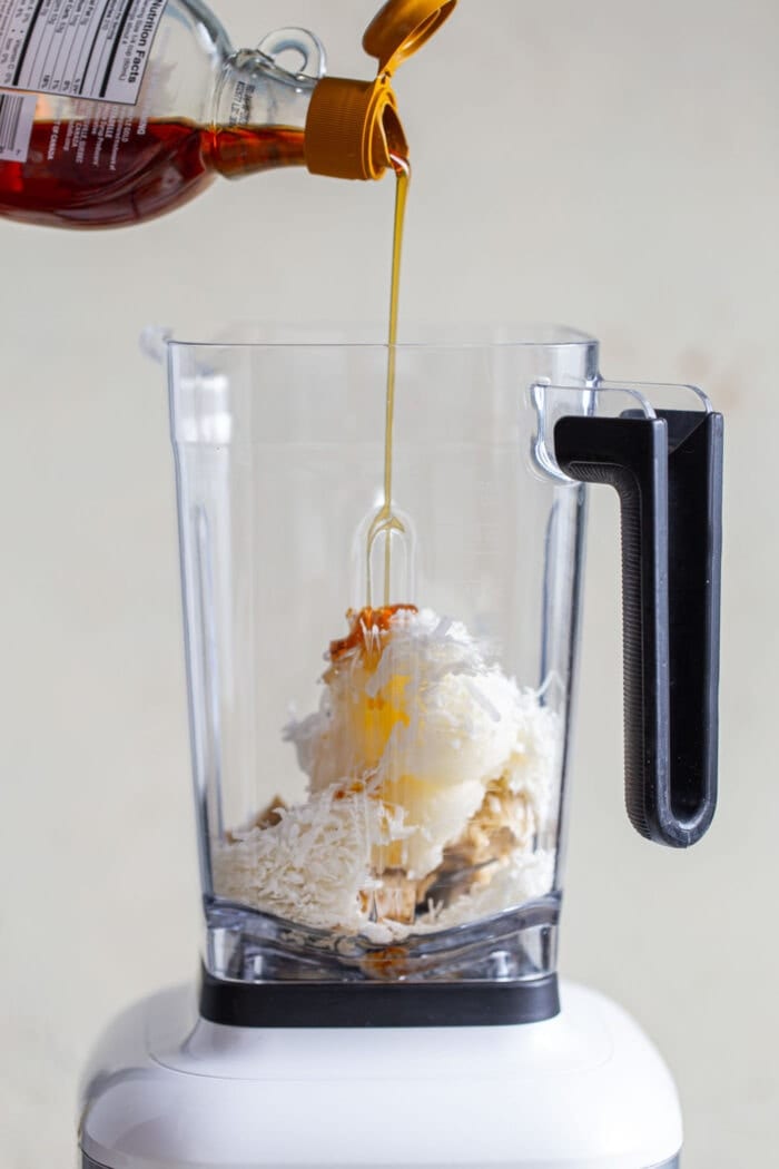 Ingredients for a no-bake pie filling in a high-speed blender.