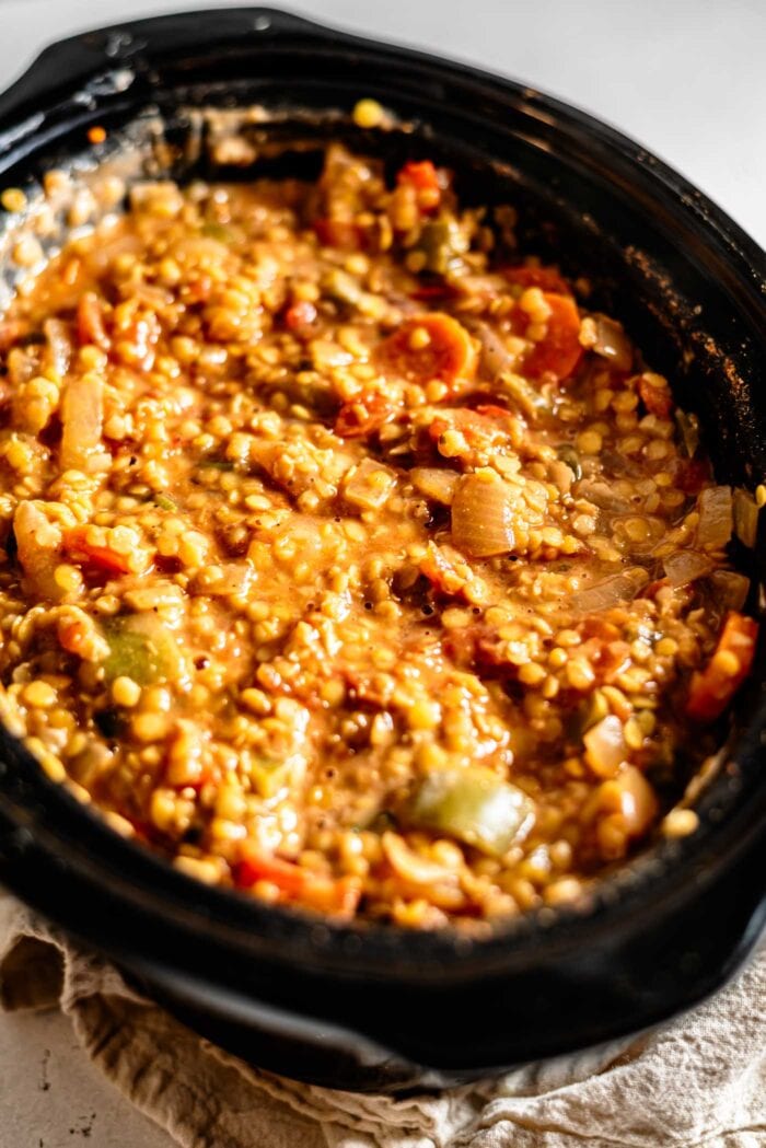 Red lentil chili in a slow cooker.